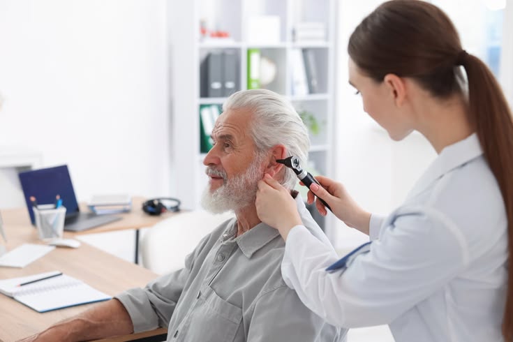hearing,test.,doctor,examining,patient